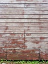 Front view of exterior wooden wall. Wall of horizontal wooden sheets. Close up of old fence of wooden planks. Architecture and Royalty Free Stock Photo
