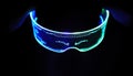 Front view of eyeware goggles colorful neon light, futuristic digital innovation concept, glow in dark background, cyber device, Royalty Free Stock Photo