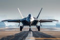 Front view of an F-22 Raptor fighter jet accelerating during takeoff on an aircraft carrier runway. The aircraft is sent Royalty Free Stock Photo