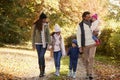 Front View Of Family Enjoying Autumn Walk In Countryside Royalty Free Stock Photo