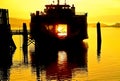 Silhouette of a car ferry at sunrise in a northwest harbor Royalty Free Stock Photo