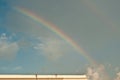 tropical rainbow, after a rains storm, with sky clearing