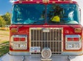 Front view of a fire truck ready for an emergency response Royalty Free Stock Photo