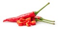 Front view of fresh red chili or peppers with slices or pieces isolated on white background with clipping path. Hot spices Royalty Free Stock Photo