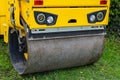 Front detail of yellow road roller. Closeup. Royalty Free Stock Photo