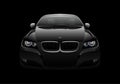 Front view of a generic and brandless modern car with lights on a black background. Vector Royalty Free Stock Photo