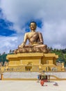 Front view of giant Buddha Dordenma statue with the blue sky and clouds background, Thimphu, Bhutan