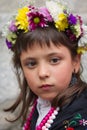 Front view of girl wearing typical flower tiara at `La Maya` festival.