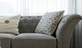 Grey couch with throw pillows Royalty Free Stock Photo