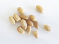 Front view of group of peeled natural peanuts on white background. Organic dried fruits for a healthy diet and ideal for peanut