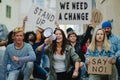 Group of people activists protesting on streets, strike, demonstration and coronavirus concept. Royalty Free Stock Photo