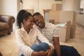 Happy African American couple head to head on floor Royalty Free Stock Photo