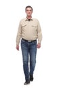 Front view of happy casual man walking Royalty Free Stock Photo