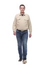 Front view of happy casual man walking Royalty Free Stock Photo