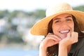 Happy woman with white smile on the beach looks at you Royalty Free Stock Photo