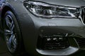 Front view headlight of a BMW 750 G11G12 7-series. Car exterior details. Royalty Free Stock Photo