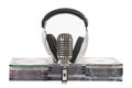 Front view of headphones, vintage microphone Royalty Free Stock Photo