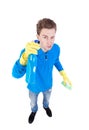 Front view of a houseowner in gloves with sponge and detergent. Royalty Free Stock Photo