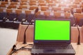 Front view of the laptop and microphones during business conference in conference room or hall, panel duscusion of economic Royalty Free Stock Photo