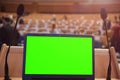 Front view of the laptop and microphones during business conference in conference room or hall, panel duscusion of economic Royalty Free Stock Photo