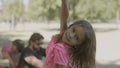 Front view of little girl mugging and posing for camera