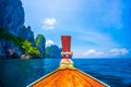 Front view of Longtail boat at Phi Phi Islands sea Asia Thailand, wooden boat in the middle of the blue sea Royalty Free Stock Photo