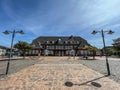 Front view of the main station and the station forecourt in Westerland on Sylt during a sunny day