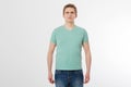 Front view male tshirt mockup. Young man wearing blank mint t-shirt isolated on white background. Copy space. Place for Royalty Free Stock Photo