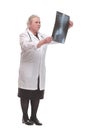 Medical doctor analysing x-ray image looking at camera and smiling Royalty Free Stock Photo