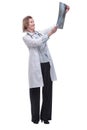 Medical doctor analysing x-ray image looking at camera and smiling Royalty Free Stock Photo