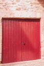 Closed, pair of, colorful, red, wood, door, shutters, reidence in Sablet, France