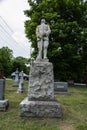 Front view of a Memorial tombstone and statue to a WW I fallen soldier, West Virginia