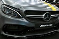 Front view of a Mercedes Benz C 63s AMG coupe 2017. Front Headlight. dark Matt colour .Car exterior details.