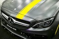 Front view of a Mercedes Benz C 63s coupe 2017. Front Headlight. Dark Matt colour .Car exterior details.