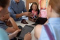 Male teacher using an human anatomy model to teach Royalty Free Stock Photo