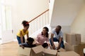 Couple and their children arriving in their new home Royalty Free Stock Photo
