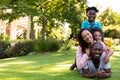 Family outside in the garden Royalty Free Stock Photo