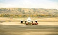 Front view of modern airplane at terminal gate ready for takeoff