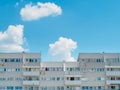 Front view of modern apartment building against blue sky in a sunny day. urban accommodation district Royalty Free Stock Photo