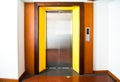 Front view of a modern elevator with closed doors in lobby Royalty Free Stock Photo