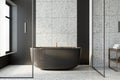 Front view of modern loft bathroom interior design with stone grey floor, black and stone walls and window with city view. 3D