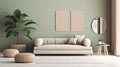 Front view of a modern luxury living room. Light green wall with poster templates and mirror, couch with cushions Royalty Free Stock Photo