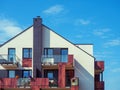 front view of modern new apartment house over blue sky background Royalty Free Stock Photo