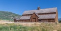 Front view of a mountain barn with blue sky Royalty Free Stock Photo