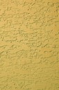 Mustard yellow colored abstract pattern concrete wall