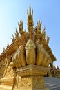 Front view of Naga or Dragon balustrade leading to the main shrine hall at the Golden Temple, Wat Sri Panton, in Nan, Thailand