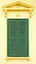 Front view of neoclassical with Bahama shutters