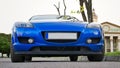 Front View of New Clean Blue Sport Car Parked on the Street Royalty Free Stock Photo