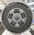 Front view of new composite clutch disc inside open housing for trucks and tractors. New friction pads. Clutch repair kit. Car mai Royalty Free Stock Photo