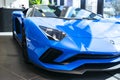 Front view of a new Lamborghini Aventador S coupe. Headlight. Car detailing. Car exterior details